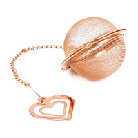 Zaparzacz `Kulka na Łańcuszku z Serduszkiem` w kolorze mosiądzu